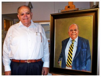 Donald S. Fortner beside his portrait